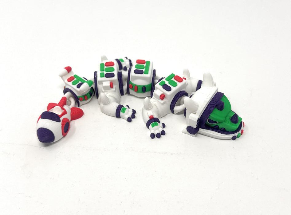 7-inch Space Astronaut Dragon in white, green, purple and red.