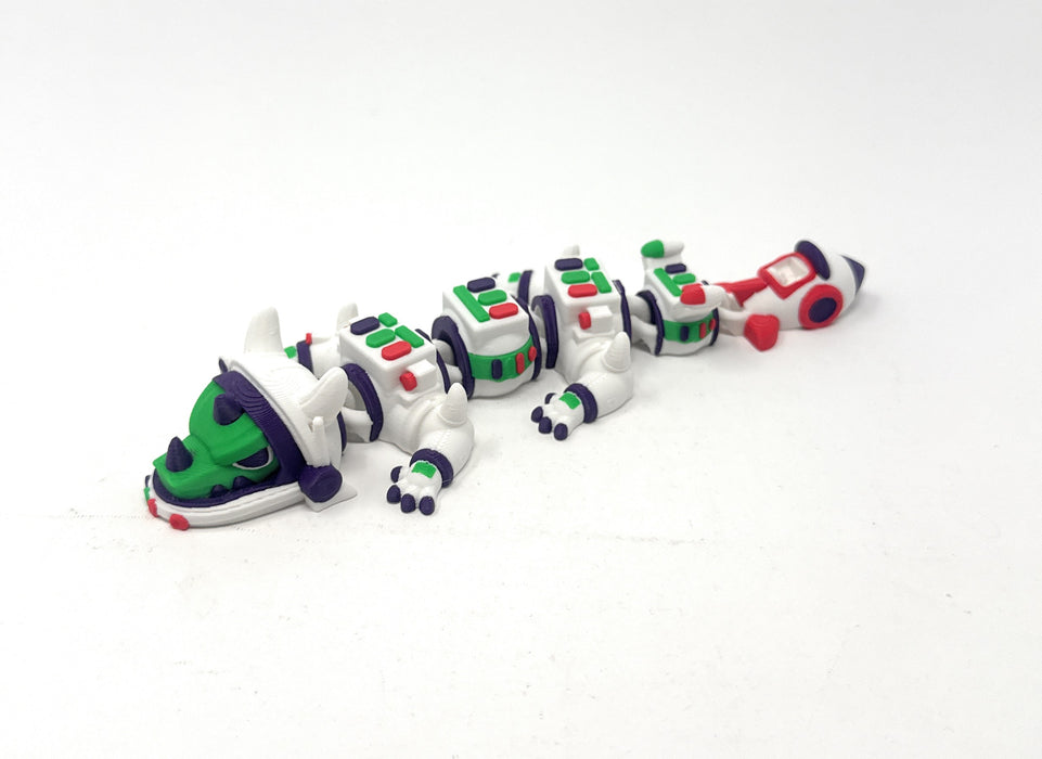 Alternate view of the Space Astronaut Dragon with helmet details and a rocket-shaped tail.